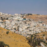 The view of city from the top of a hill