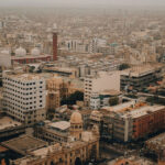 Panoramic view of city with many buildings