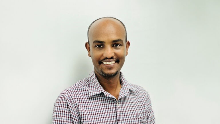 Headshot of Negash Bekele